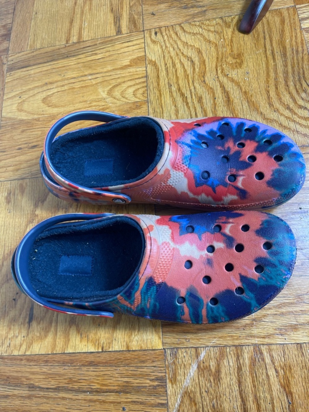 Crocs—red, white and blue.  Fleece lining. Men’s size 12
